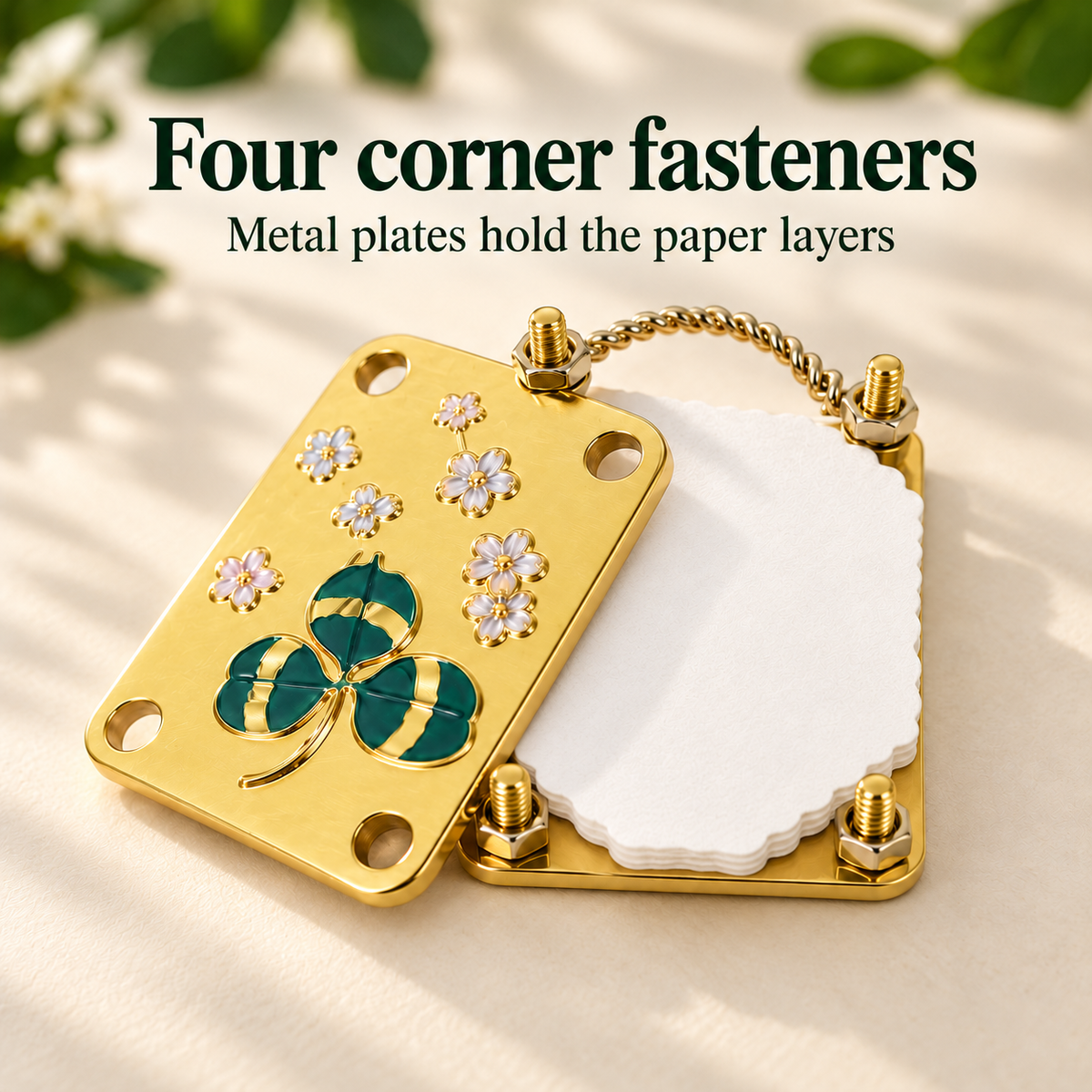 Four corner fasteners hold the metal plates and pressing-paper layers together